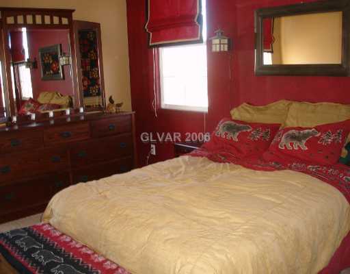 9105 Ripple Ridge Avenue, Unit 101 Las Vegas, NV 89149 - Photo 5 of 8 Master Bedroom.