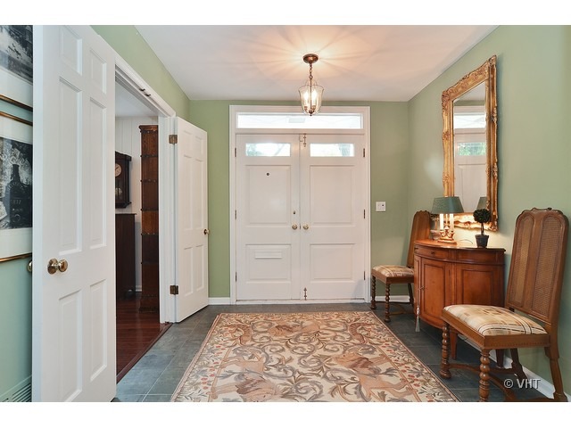 1575 Tower Road Winnetka, IL 60093 - Photo 2 of 21 a room with furniture and window
