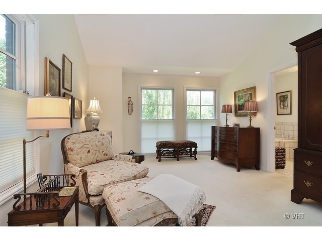 1575 Tower Road Winnetka, IL 60093 - Photo 11 of 21 a living room with furniture window and a flat screen tv