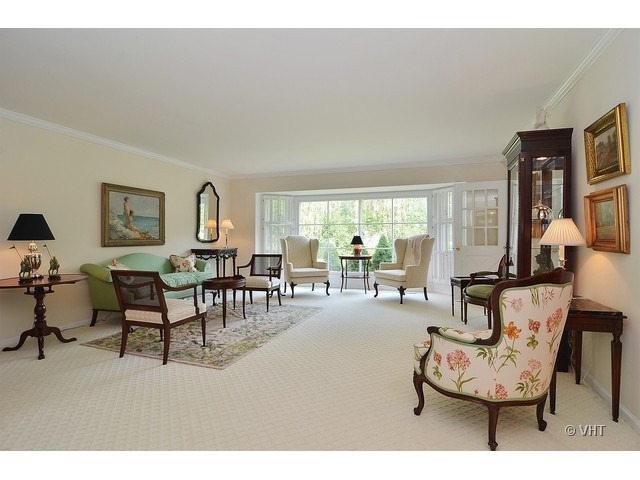 1575 Tower Road Winnetka, IL 60093 - Photo 3 of 21 a living room with furniture and a large window