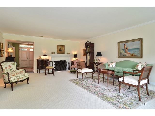 1575 Tower Road Winnetka, IL 60093 - Photo 4 of 21 a living room with furniture and a fireplace