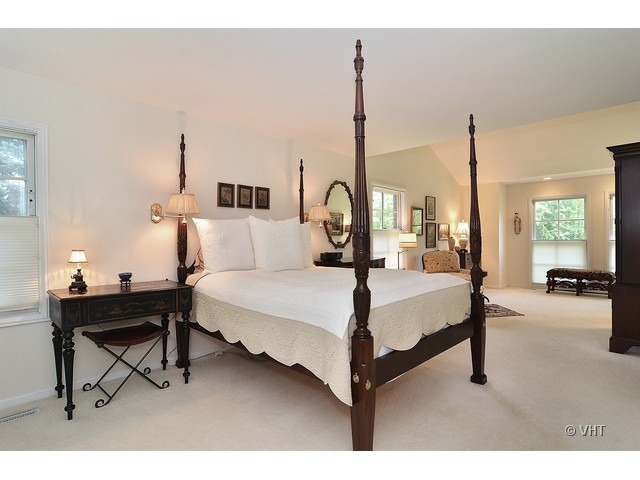 1575 Tower Road Winnetka, IL 60093 - Photo 10 of 21 a bedroom with a bed window and table
