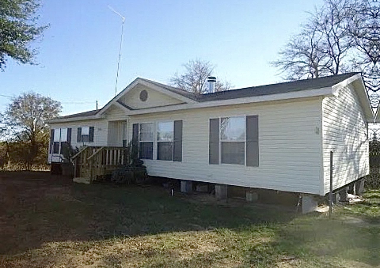 26601 Sun Belt Tool, TX 75143 - Photo 1 of 15 a front view of a house with garden