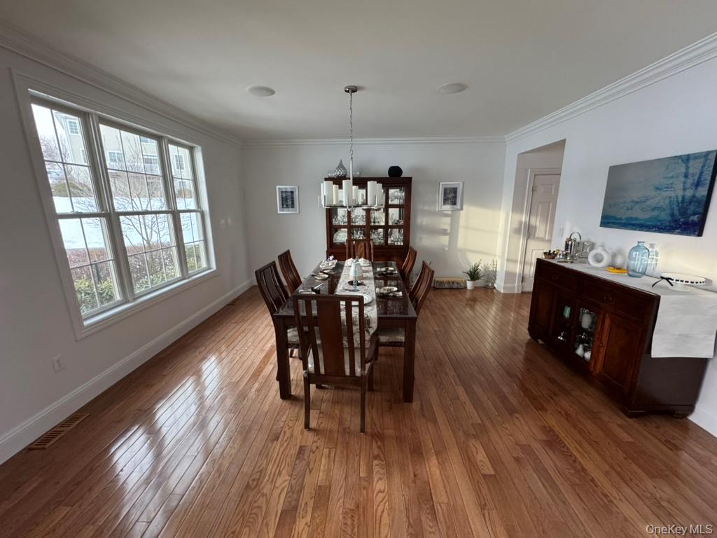 46 Mansion Ridge Boulevard Monroe, NY 10950 - Photo 8 of 35 a view of a dining room with furniture window and wooden floor