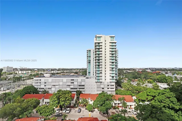 a view of a city with tall buildings