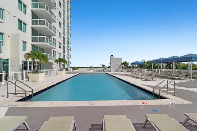 a view of a swimming pool with a terrace