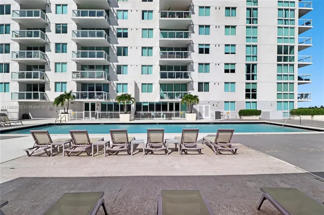 a view of a tall buildings with a street