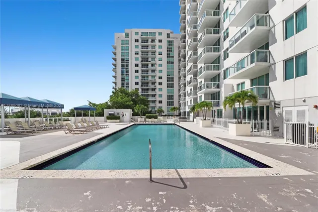 a view of a swimming pool and a terrace