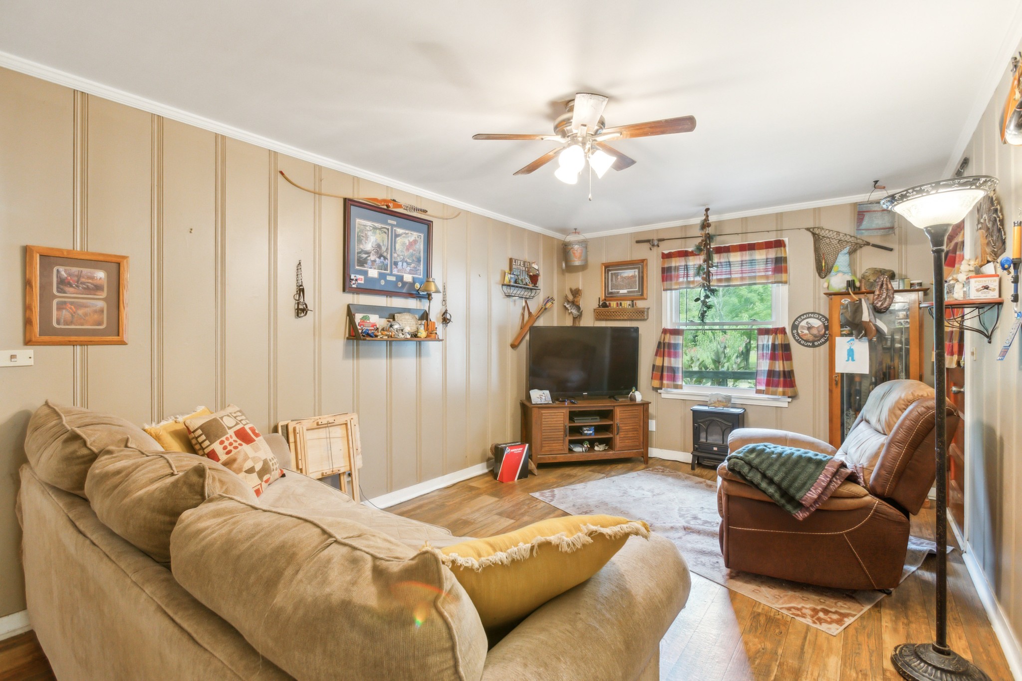 571 Jackson Road Portland, TN 37148 - Photo 18 of 24 a living room with furniture and a flat screen tv