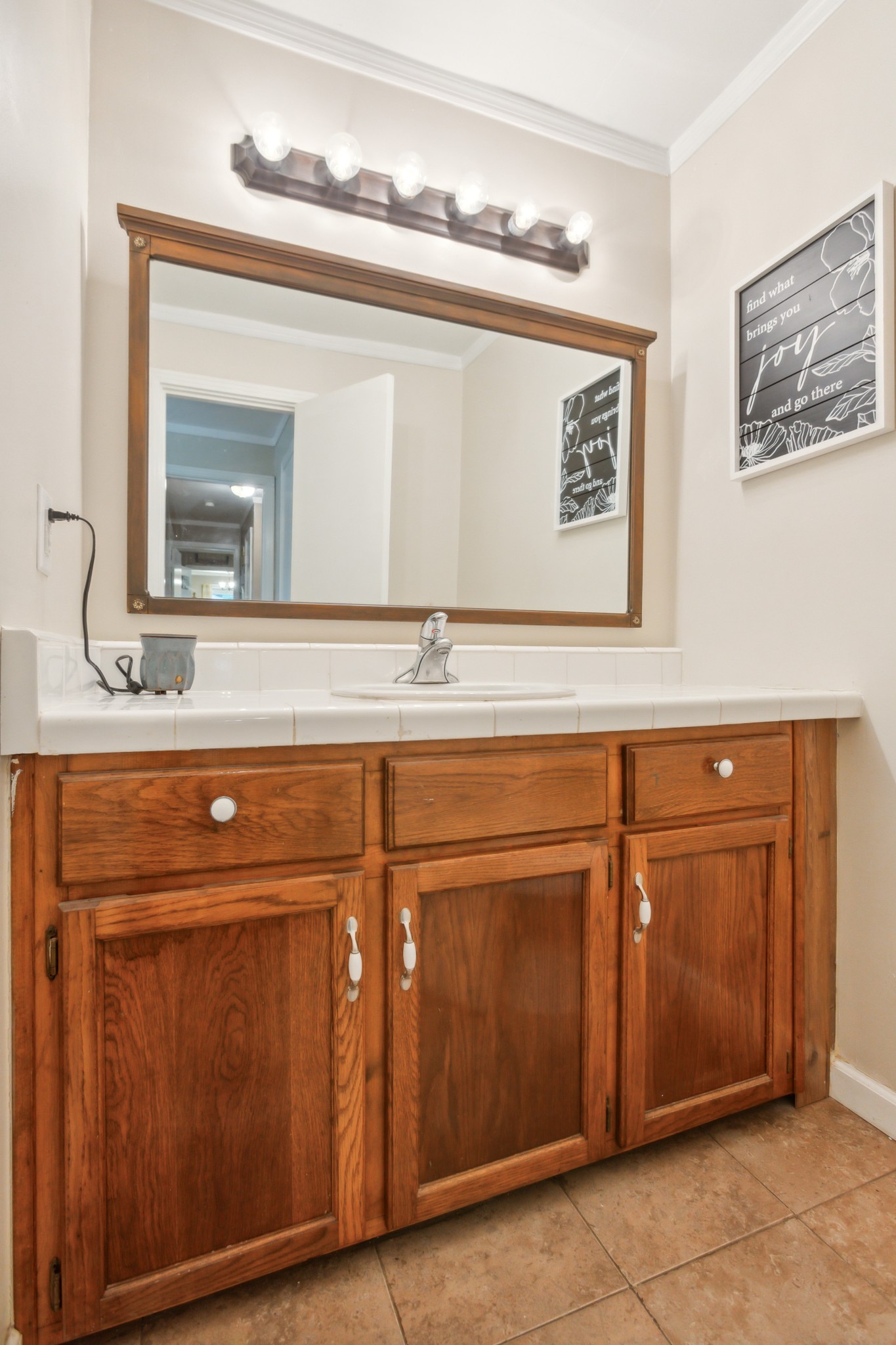 571 Jackson Road Portland, TN 37148 - Photo 21 of 24 a view of a sink and a mirror