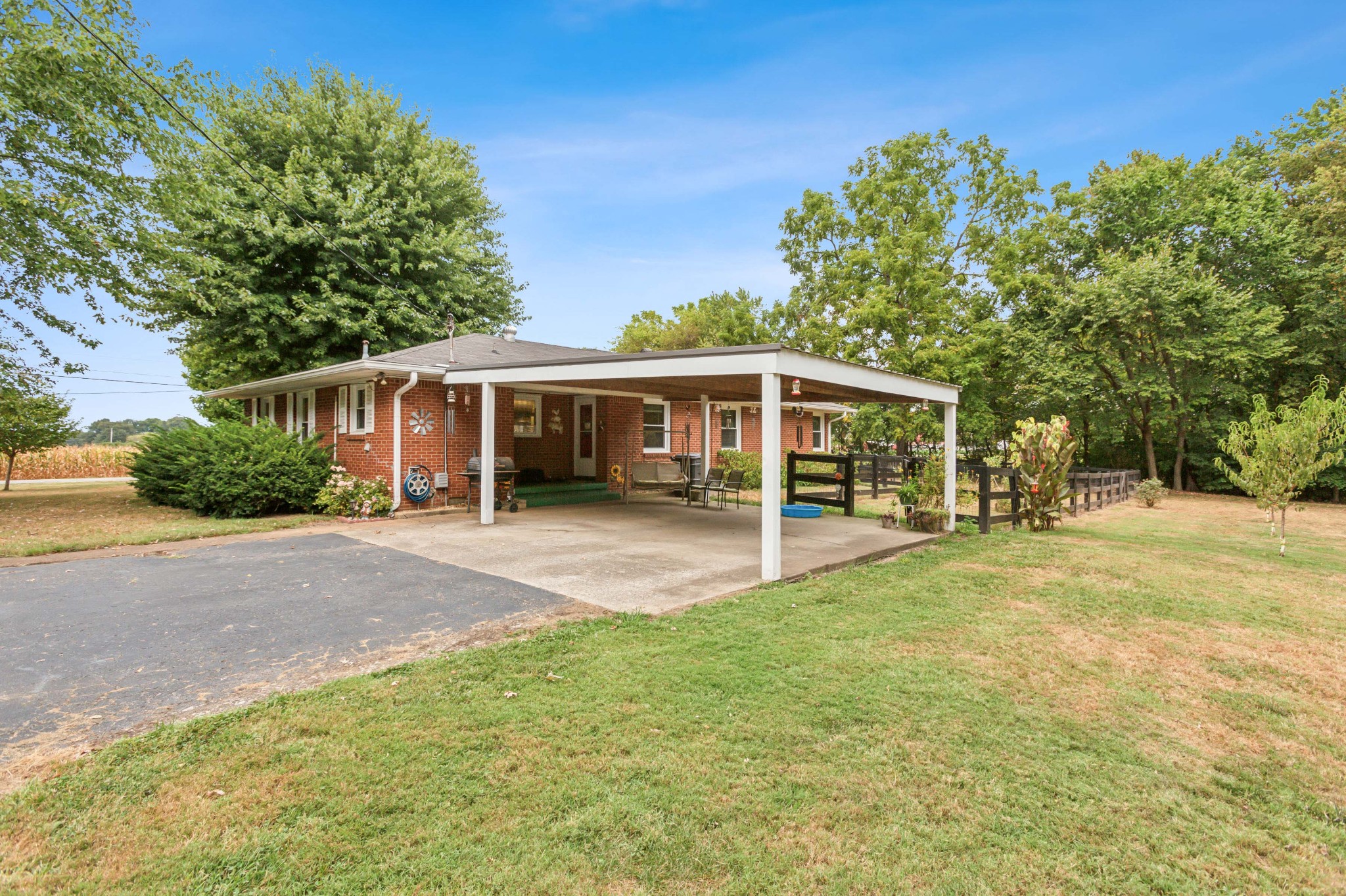 571 Jackson Road Portland, TN 37148 - Photo 22 of 24 a front view of a house with a garden
