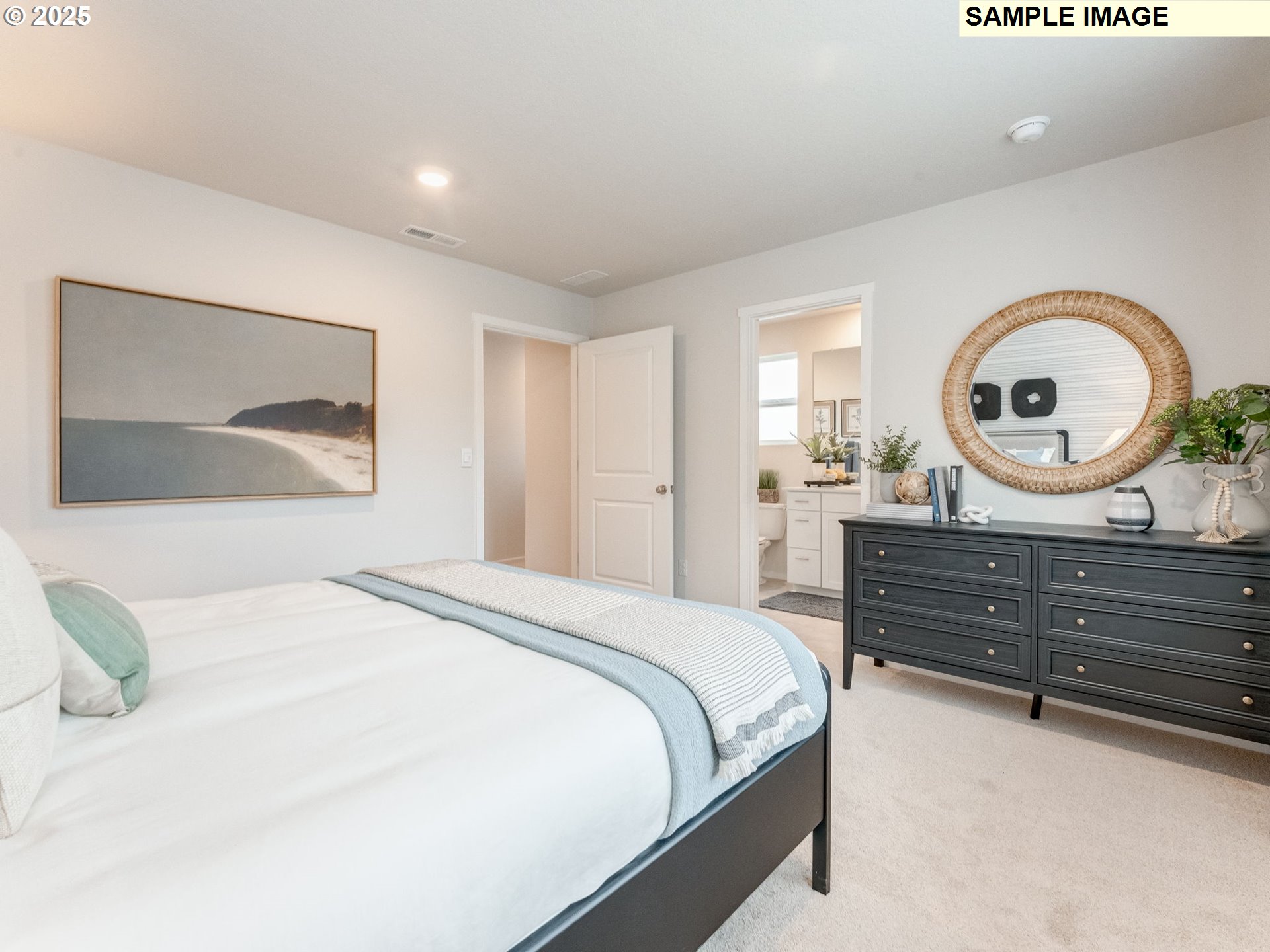 19309 Southeast 12th Way Camas, WA 98607 - Photo 20 of 24 a bedroom with a bed and a large mirror on the dresser