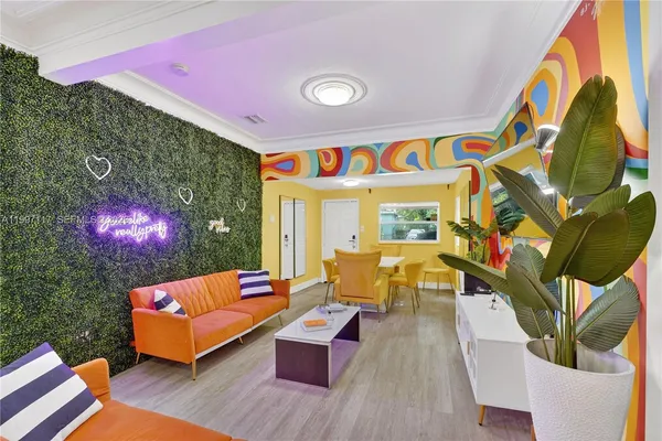 a outdoor space with patio the couches and a potted plant on a table