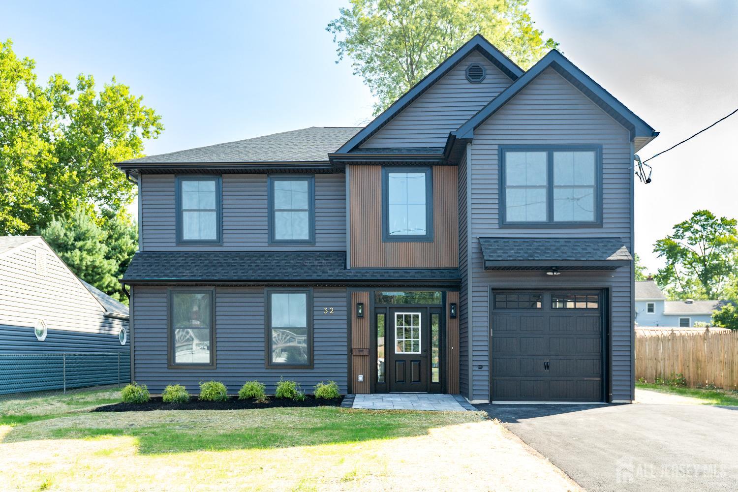 32 Weldon Road Edison, NJ 08817 - Photo 1 of 59 a front view of a house