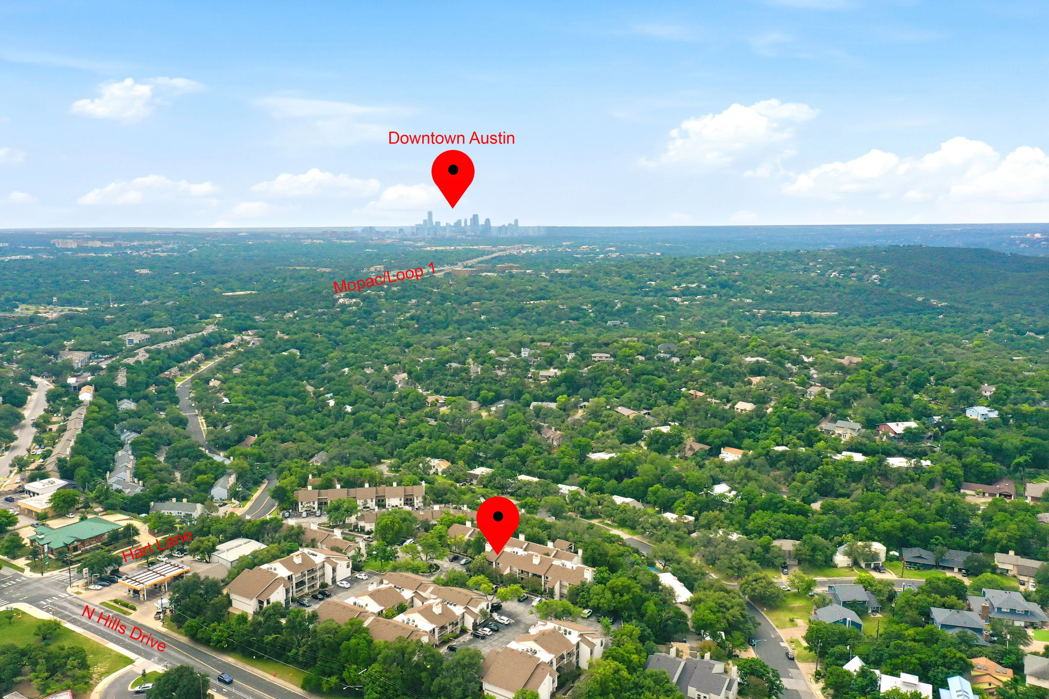 6910 Hart Lane, Unit 912 Austin, TX 78731 - Photo 30 of 36 Aerial perspective showcasing the residential area with abundant tree canopy and surrounding green spaces