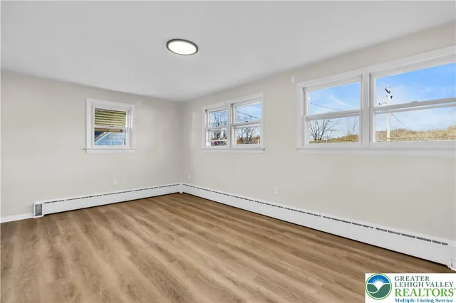 a view of an empty room and window