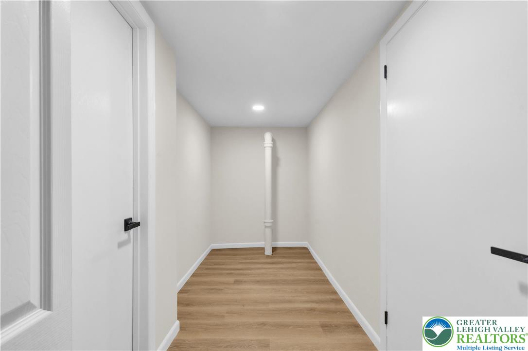 416 Main Street Stockertown, PA 18083 - Photo 20 of 29 a view of a hallway with wooden floor and closet