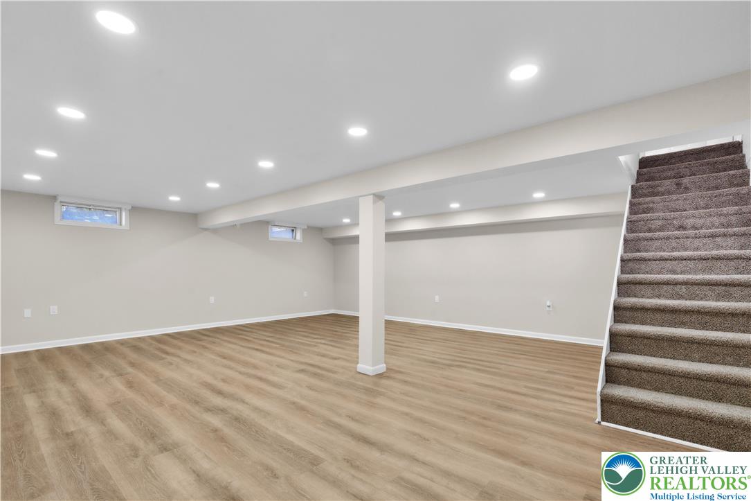 416 Main Street Stockertown, PA 18083 - Photo 22 of 29 an empty room with wooden floor