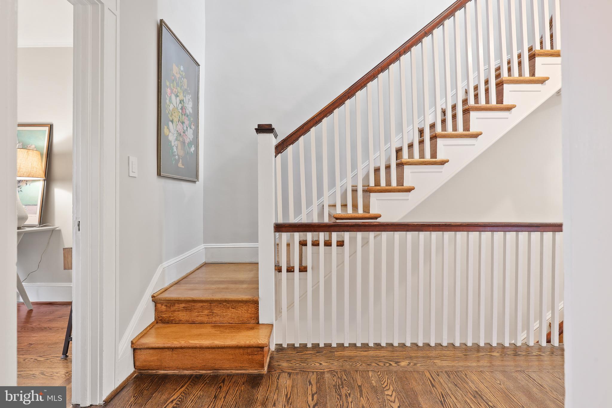 4304 Roland Avenue Baltimore, MD 21210 - Photo 27 of 45 hardwood staircase to 3rd fl w lovely bannisters