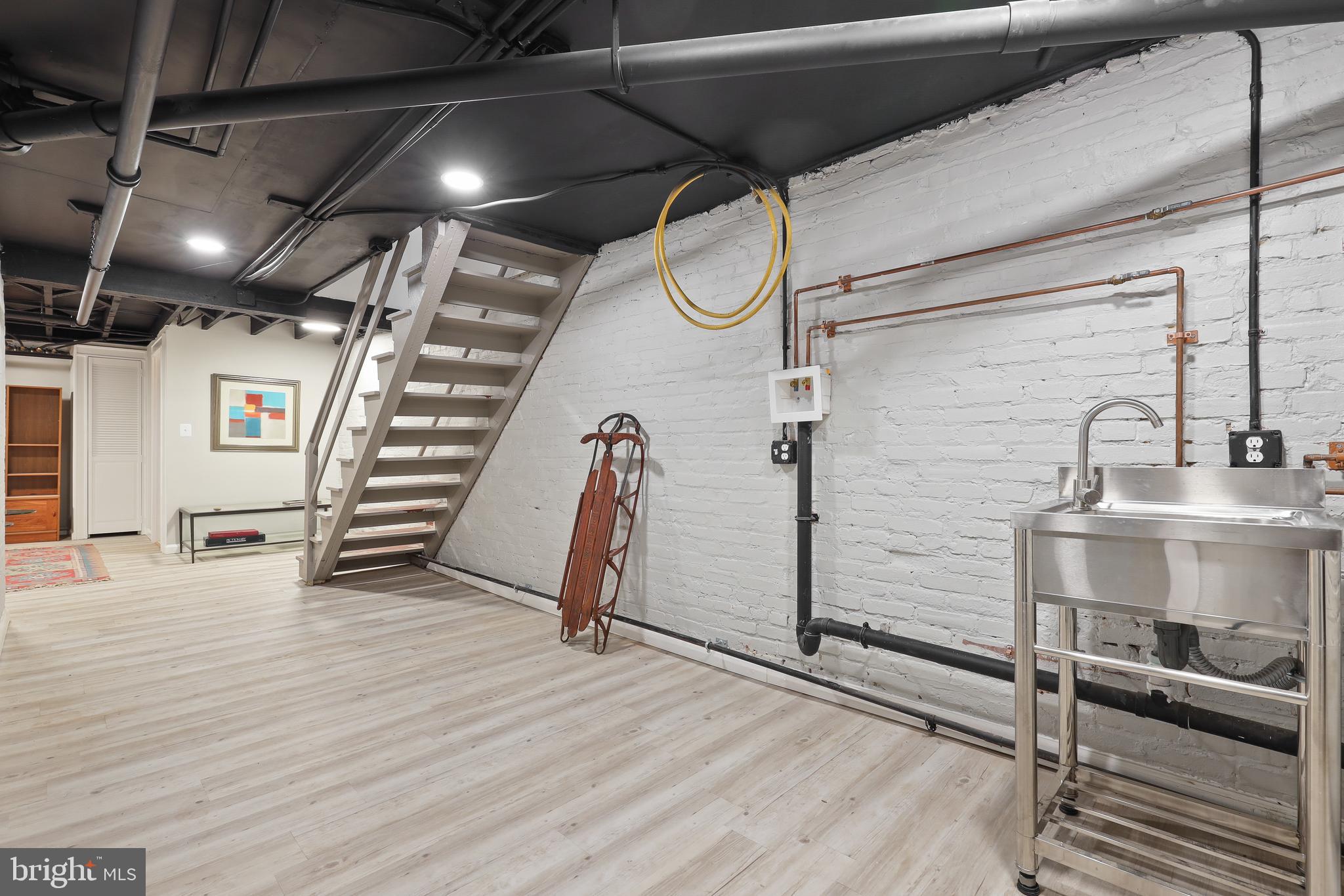 4304 Roland Avenue Baltimore, MD 21210 - Photo 39 of 45 renovated basement 350sf with laundry hookup / gas