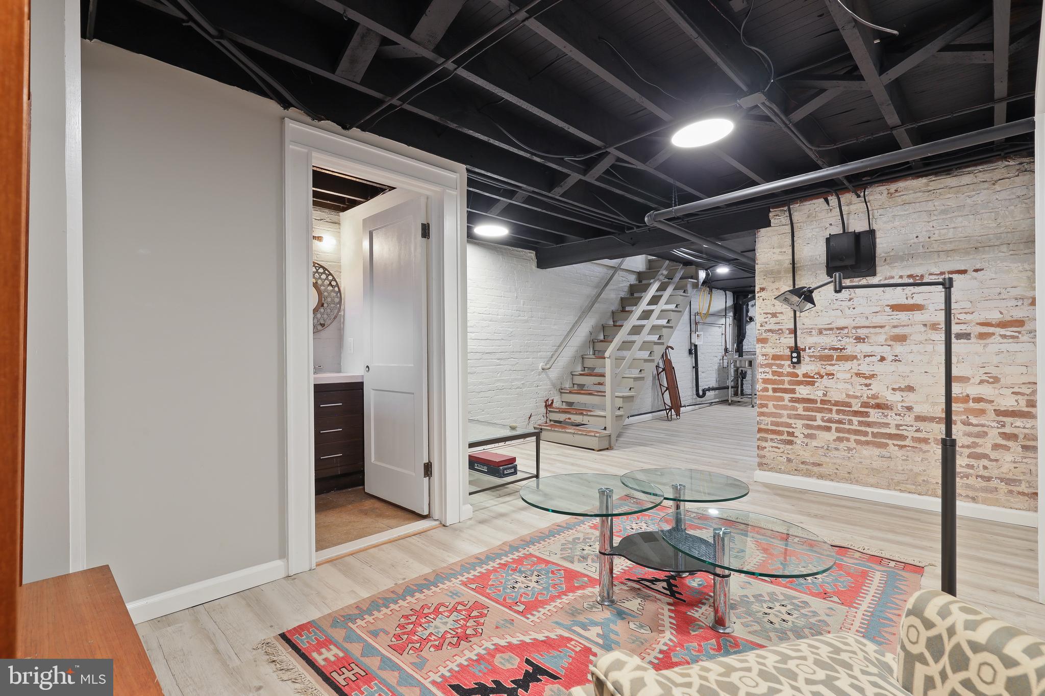 4304 Roland Avenue Baltimore, MD 21210 - Photo 40 of 45 basement with half bath and 4 windows