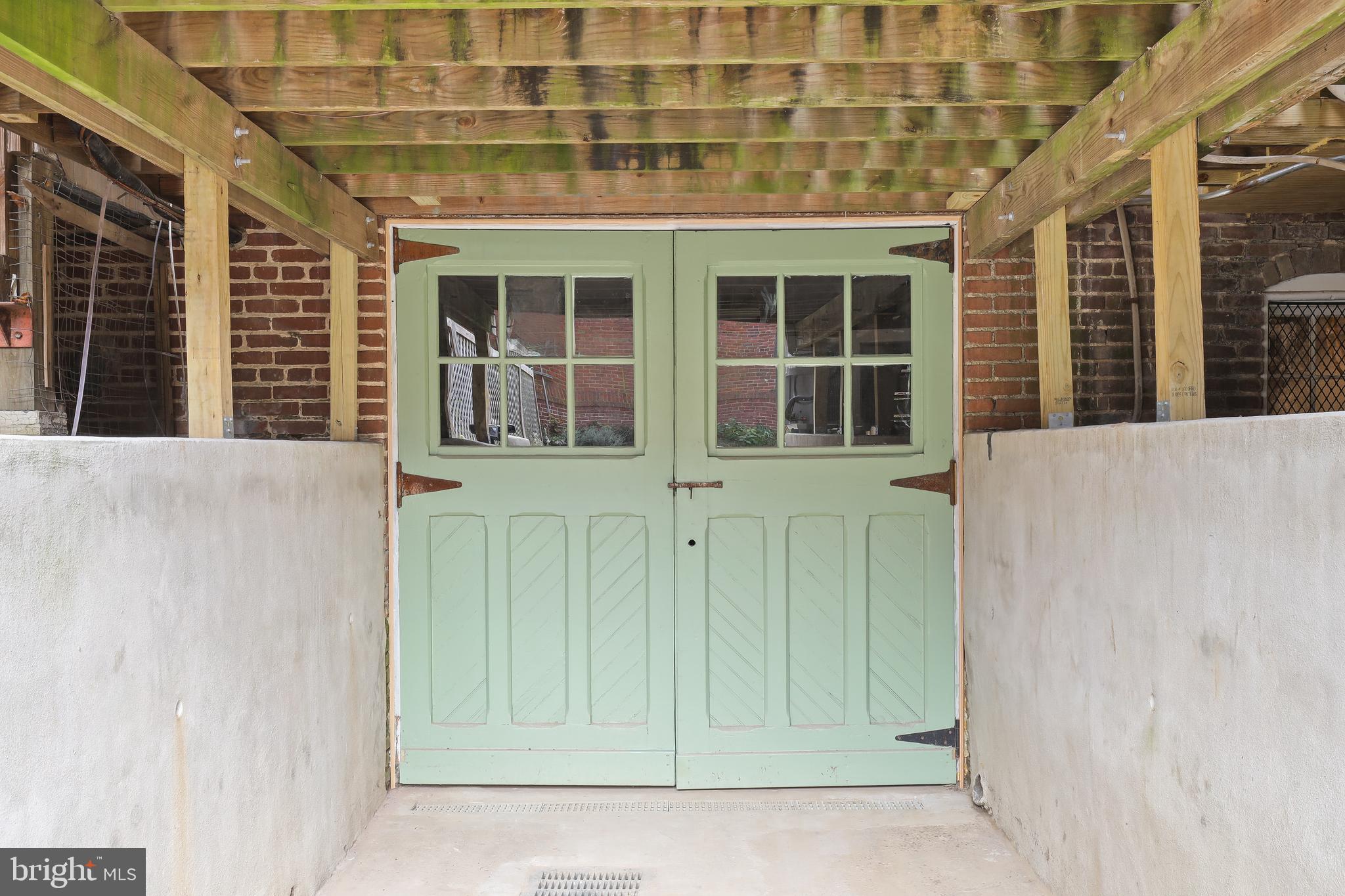 4304 Roland Avenue Baltimore, MD 21210 - Photo 45 of 45 restored garage doors with original hardware