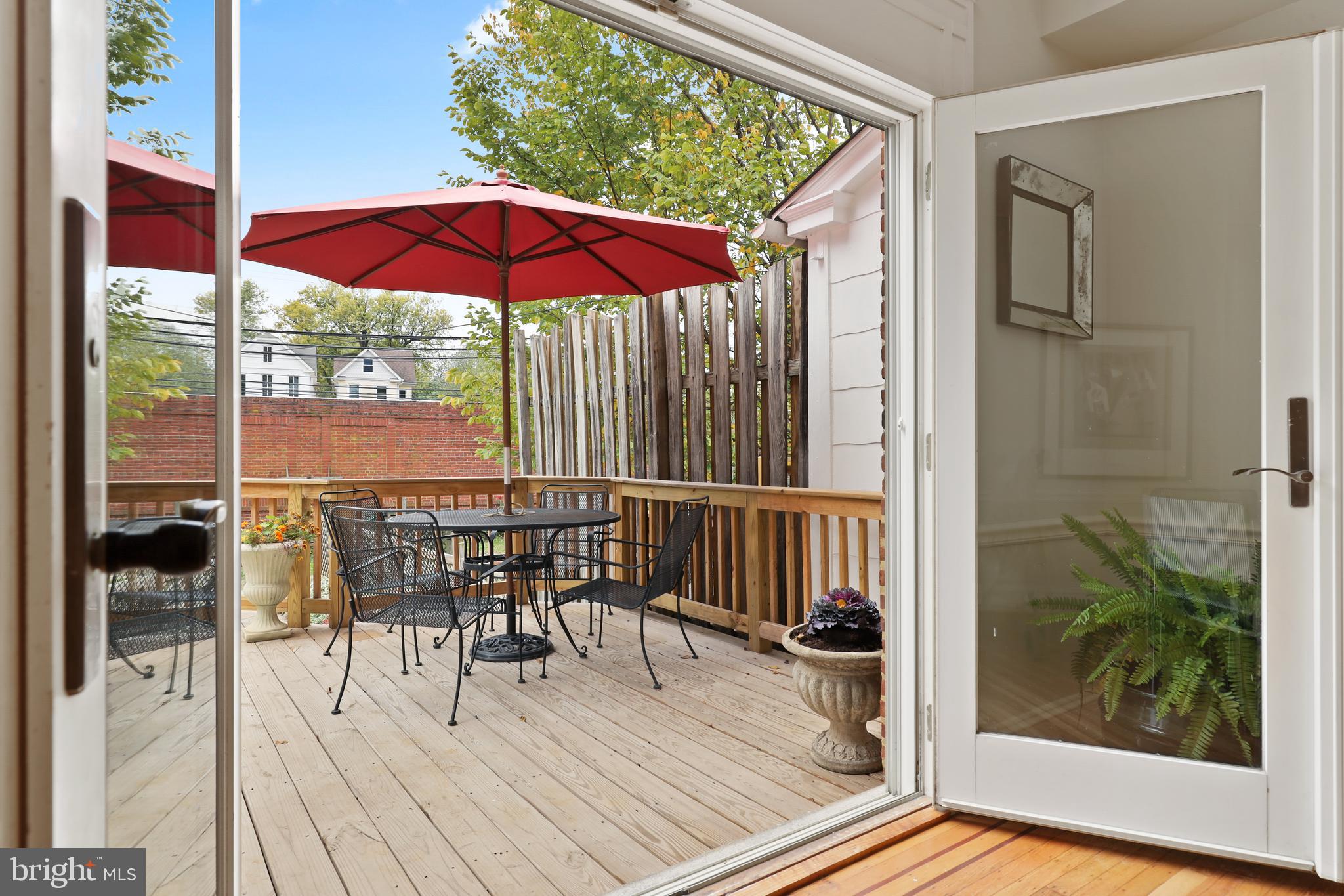 4304 Roland Avenue Baltimore, MD 21210 - Photo 7 of 45 Deck - new pressure-treated wood from DR doors