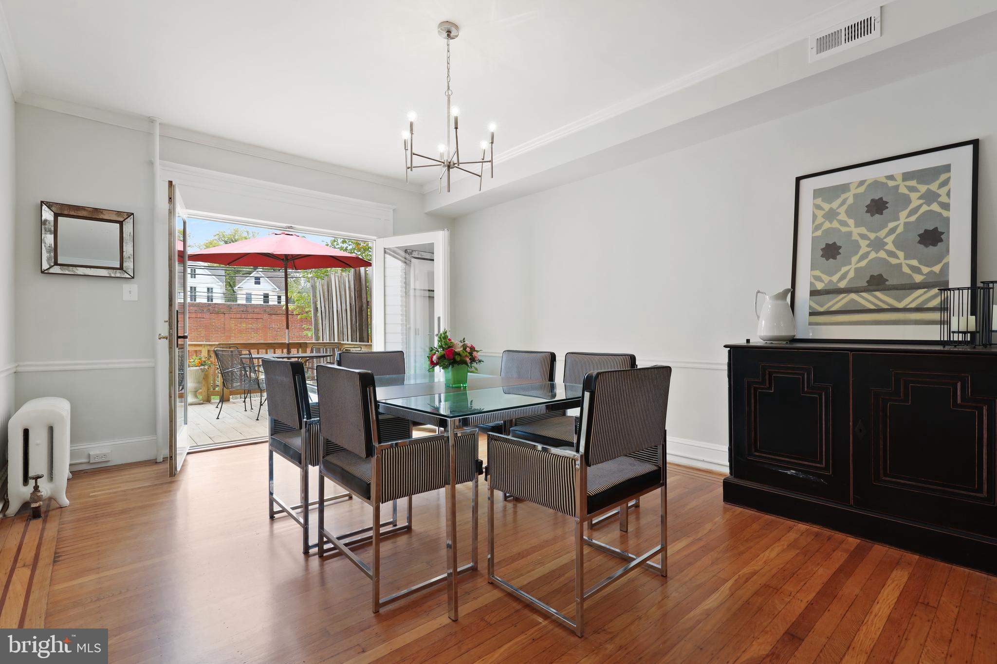4304 Roland Avenue Baltimore, MD 21210 - Photo 8 of 45 Dining room facing deck via Anderson doors