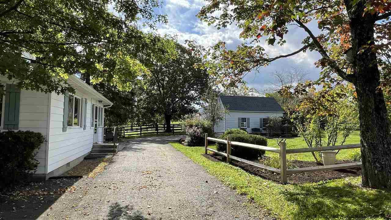 791 Hoagerburgh Road Wallkill, NY 12589 - Photo 22 of 24 a view of a house with backyard and a tree