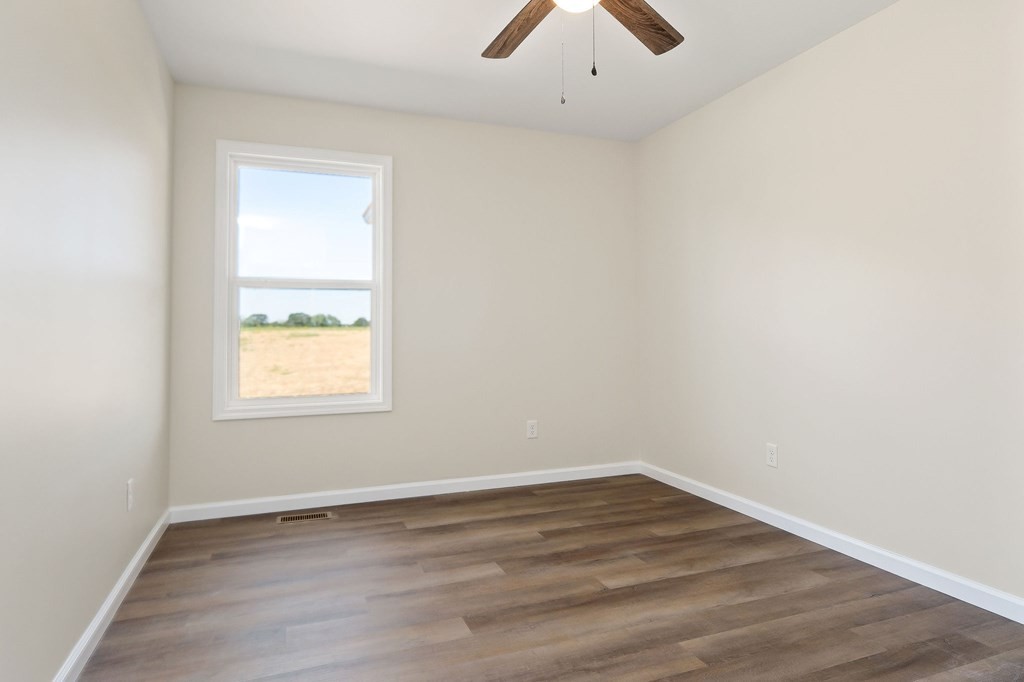 14305 Old Kentucky Road Walling, TN 38587 - Photo 11 of 31 an empty room with a window