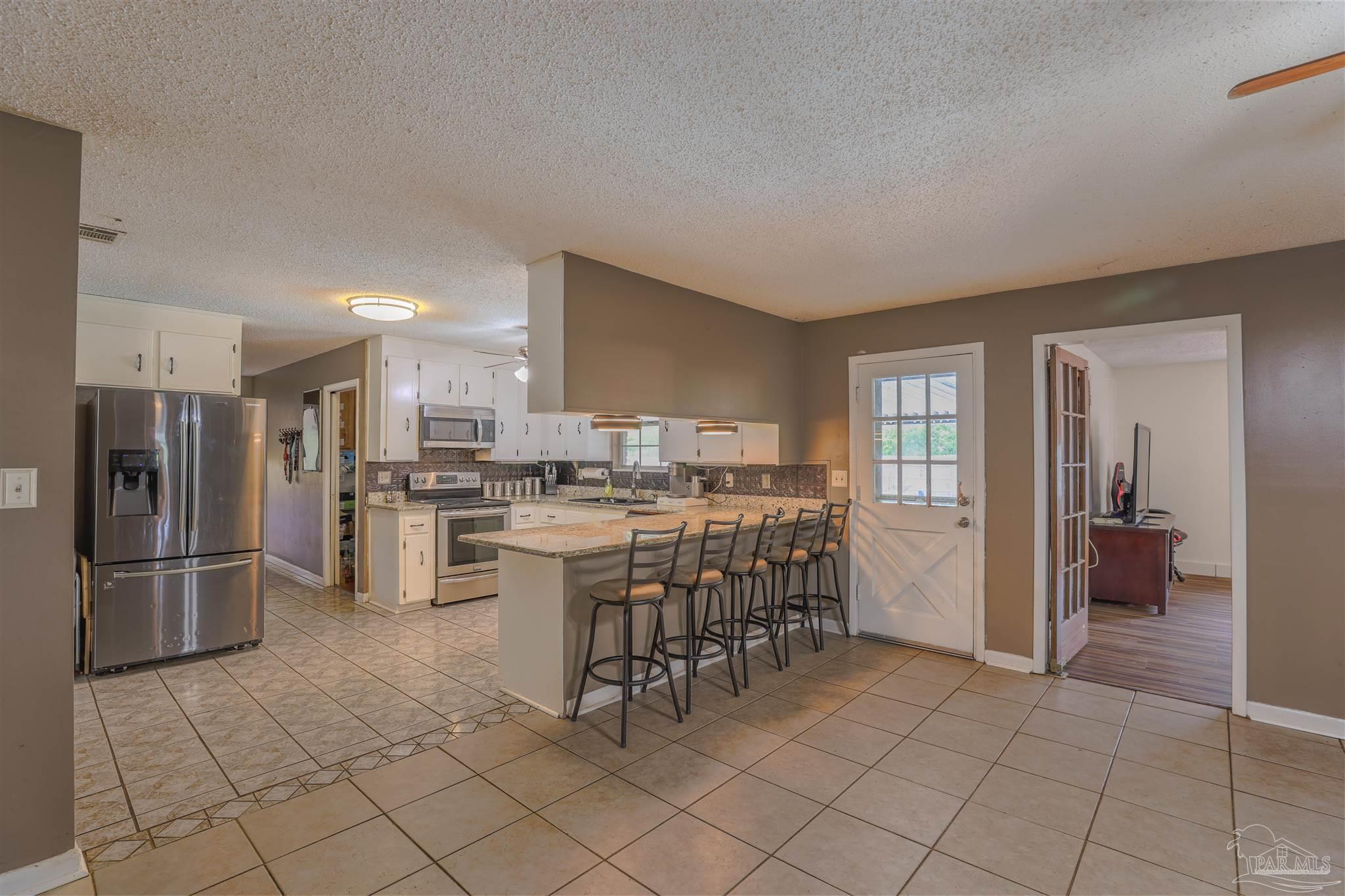 4576 Woodbine Road Pace, FL 32571 - Photo 11 of 54