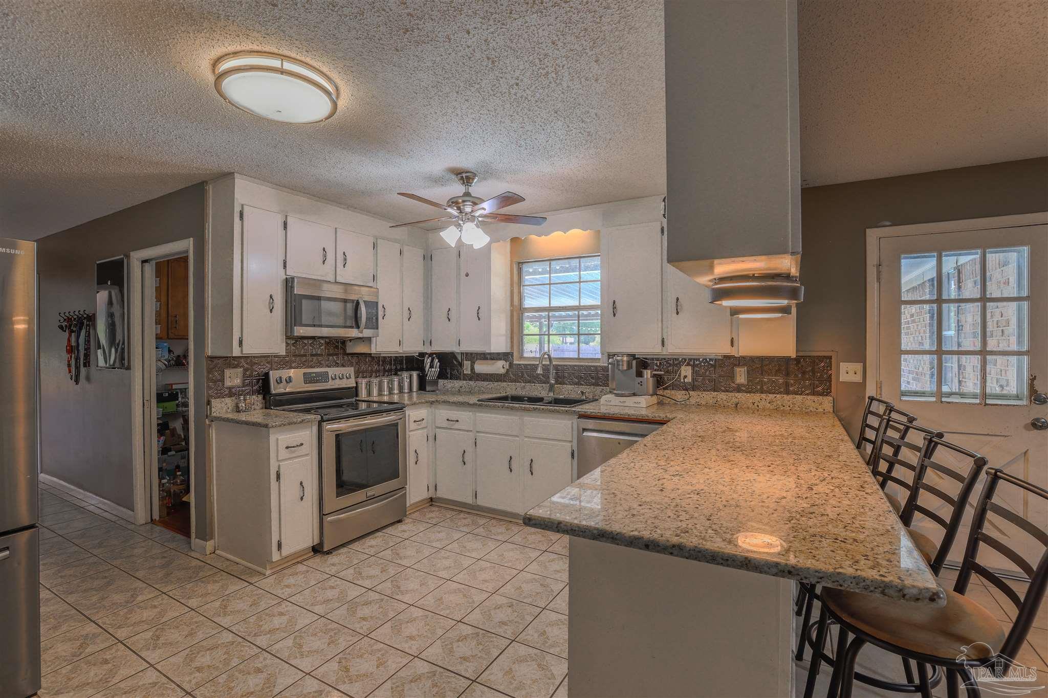 4576 Woodbine Road Pace, FL 32571 - Photo 12 of 54
