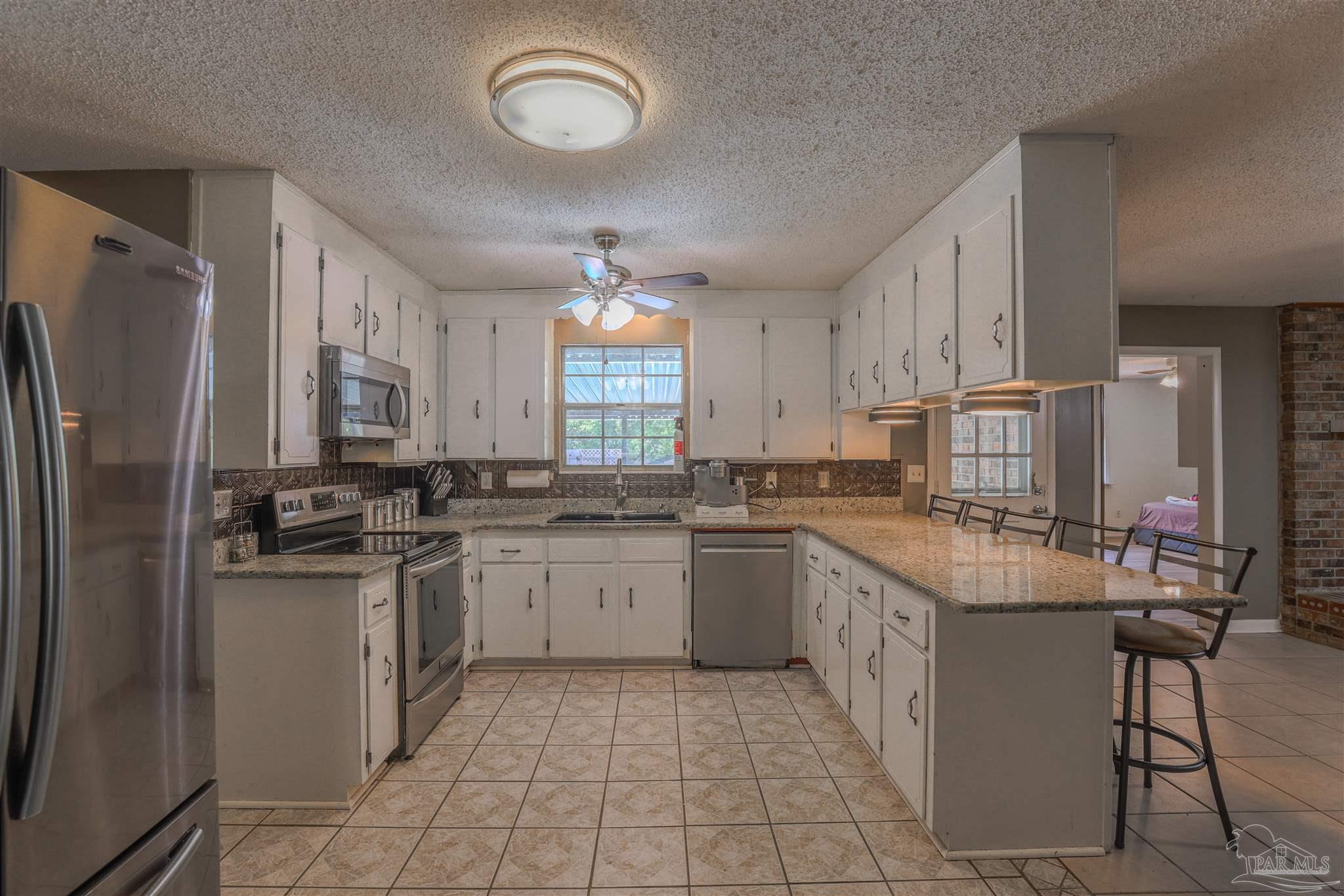 4576 Woodbine Road Pace, FL 32571 - Photo 13 of 54