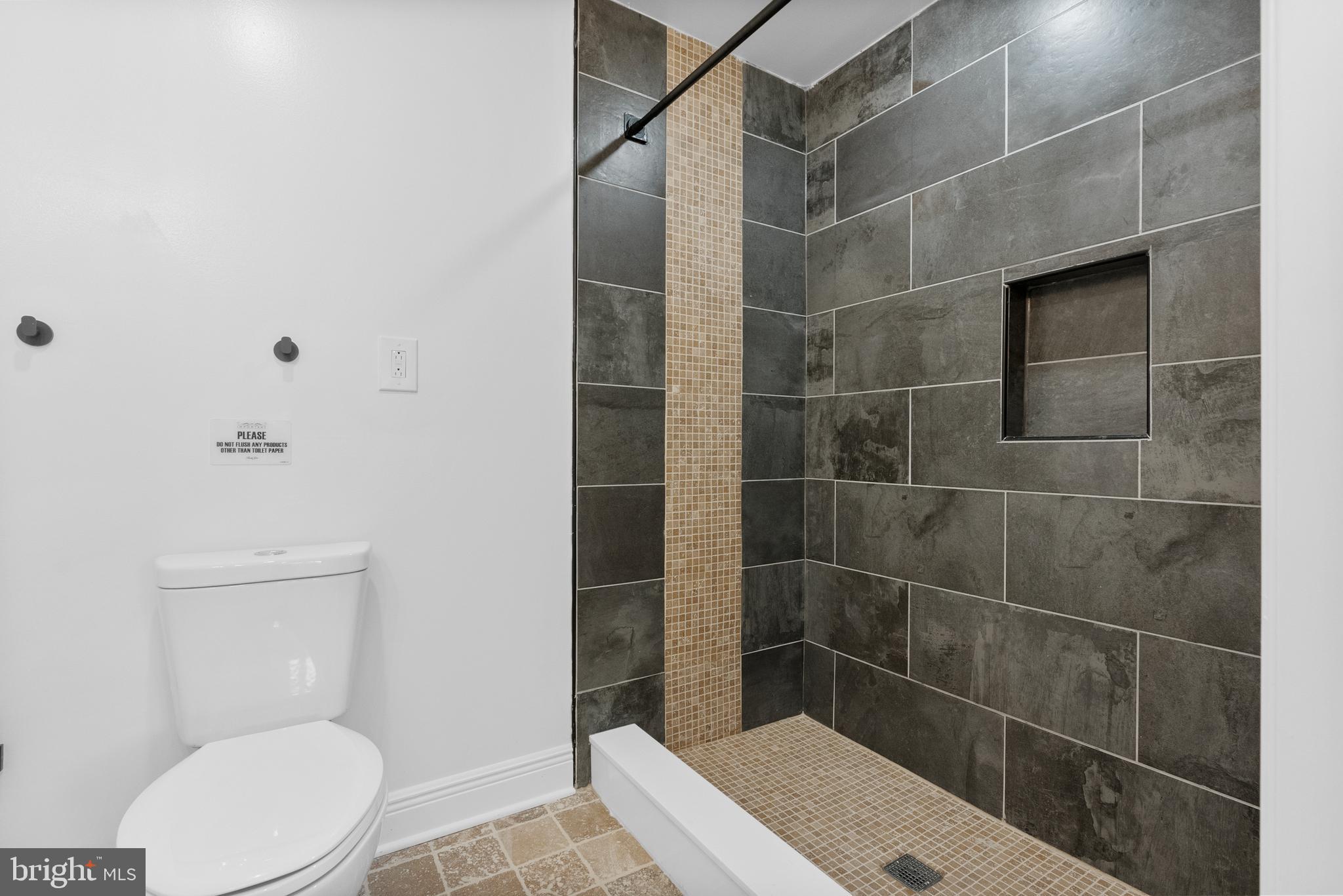 2305 North 50th Street Philadelphia, PA 19131 - Photo 11 of 33 a bathroom with a toilet and a shower