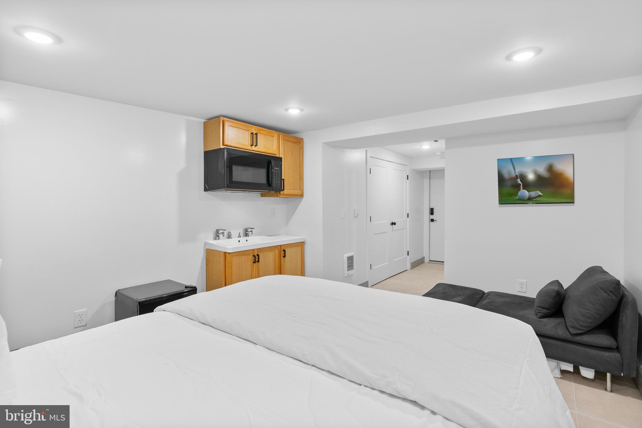 2305 North 50th Street Philadelphia, PA 19131 - Photo 17 of 33 a bedroom with a bed and furniture