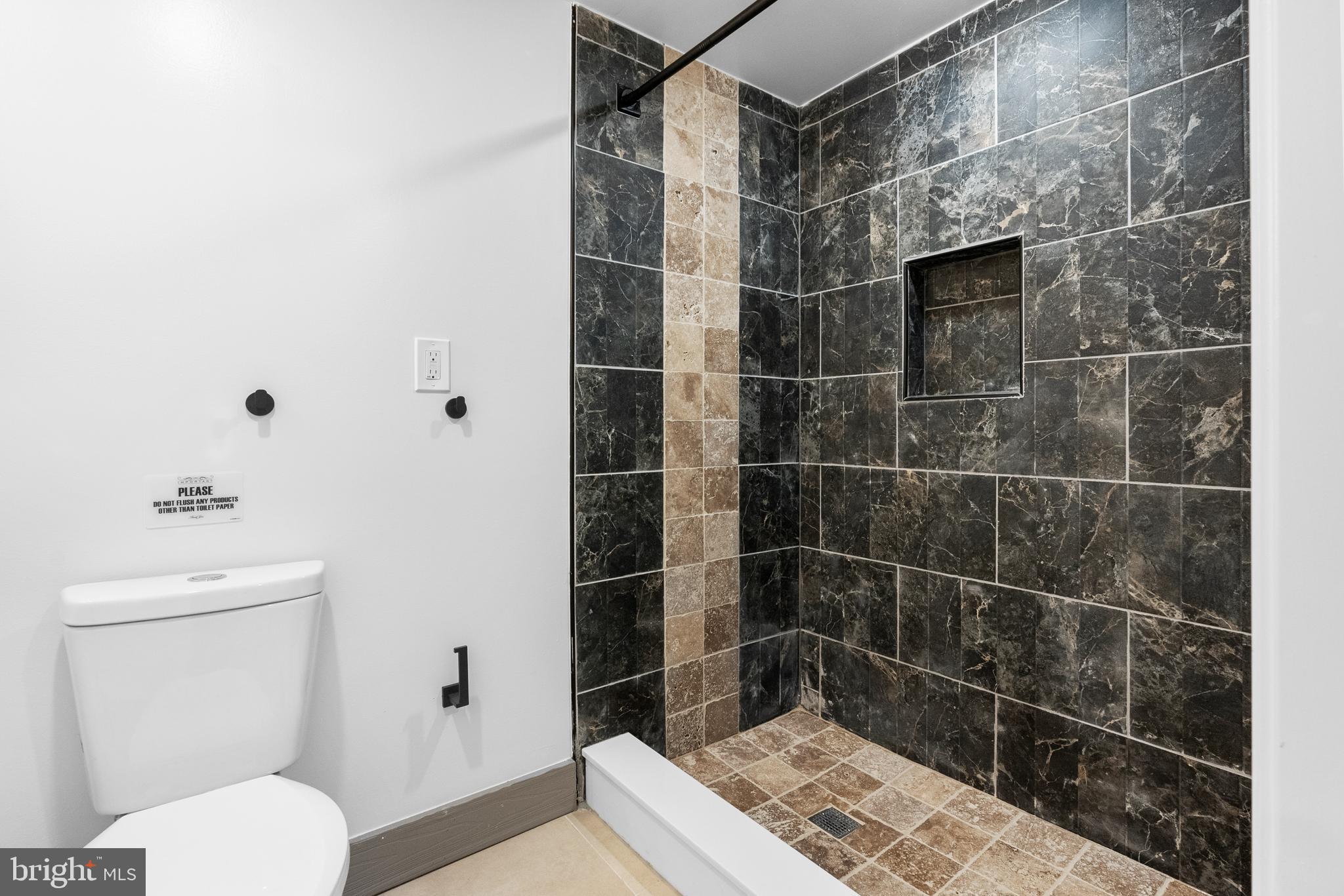 2305 North 50th Street Philadelphia, PA 19131 - Photo 18 of 33 a bathroom with a toilet and a shower