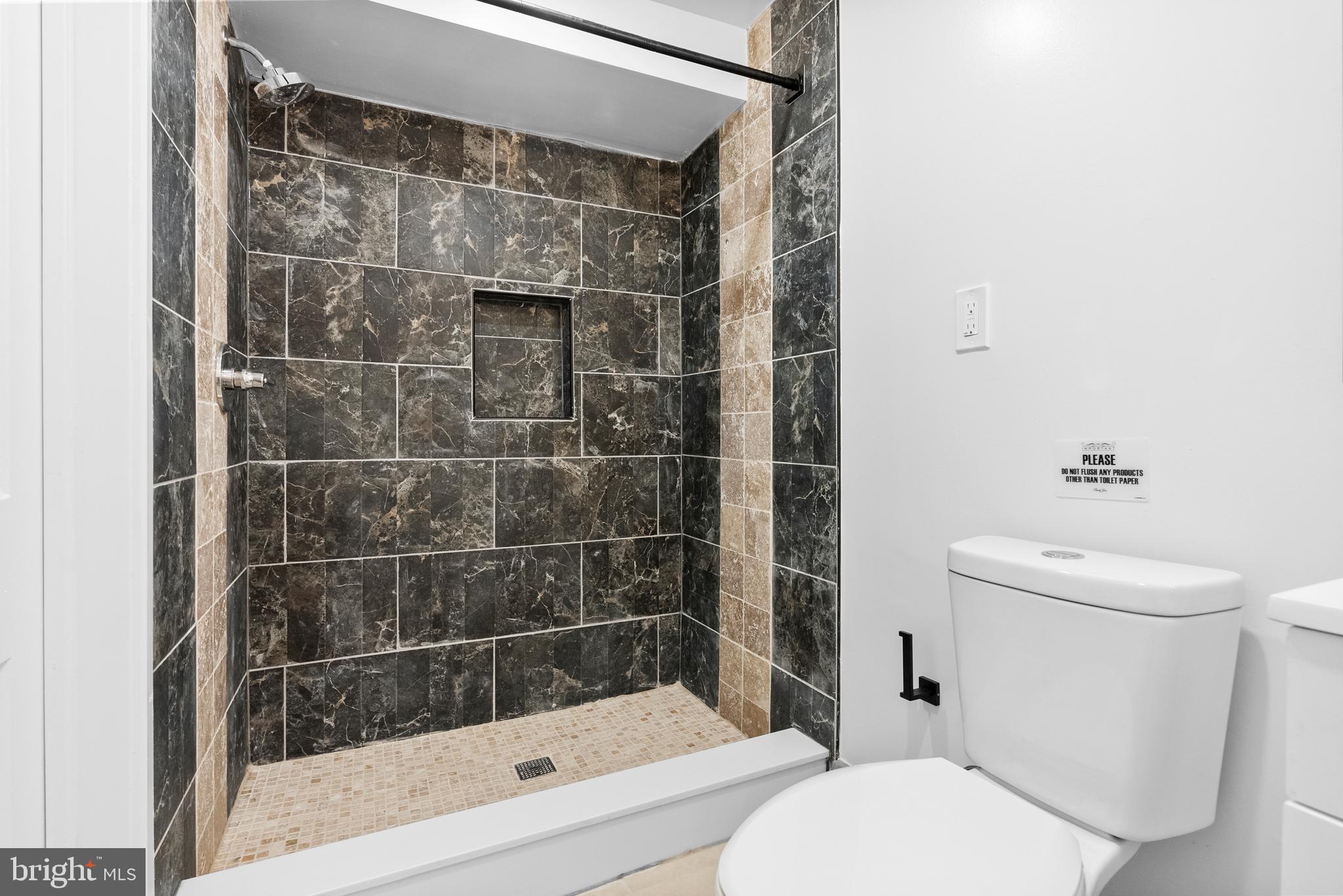 2305 North 50th Street Philadelphia, PA 19131 - Photo 22 of 33 a bathroom with a toilet and shower