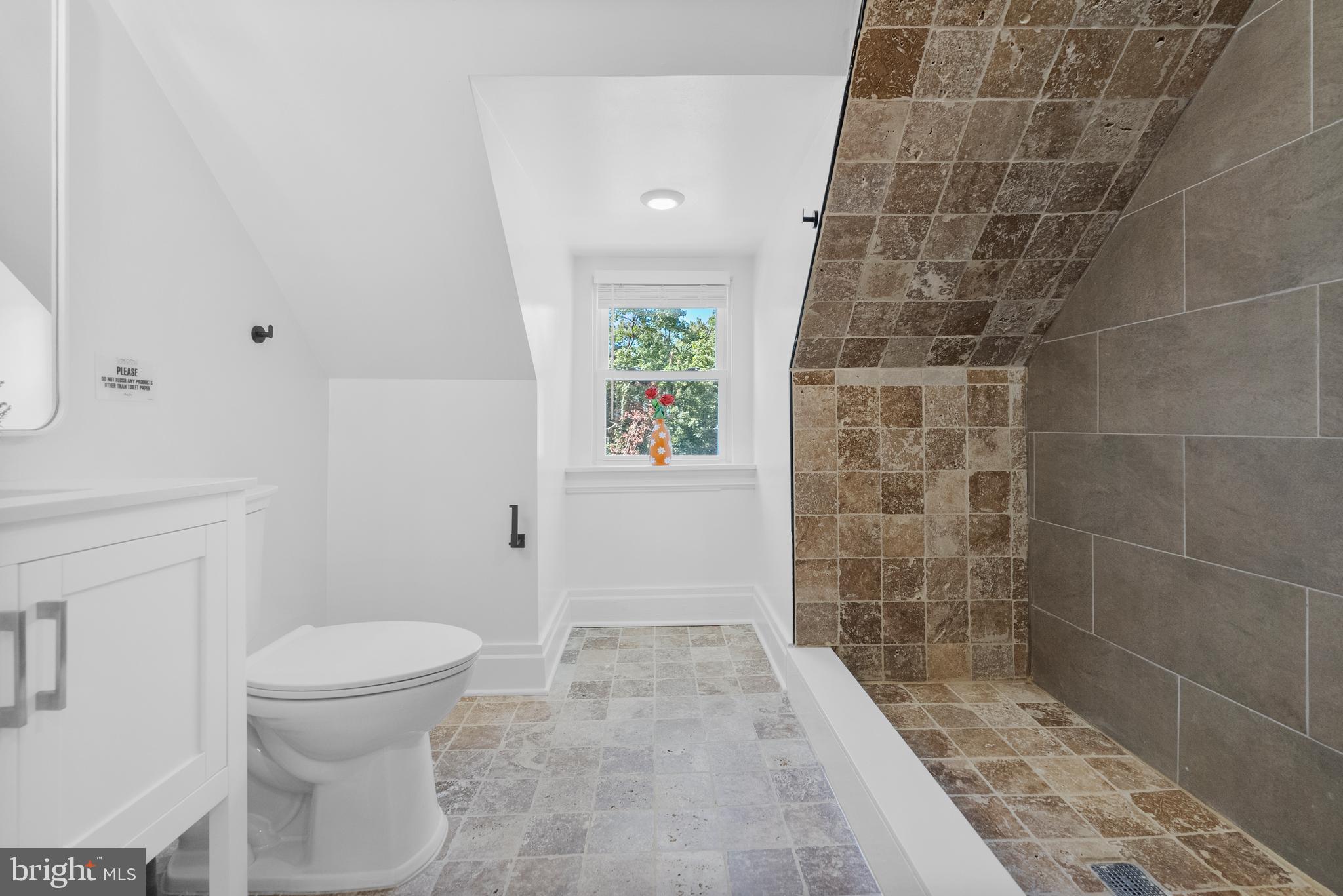 2305 North 50th Street Philadelphia, PA 19131 - Photo 32 of 33 a bathroom with a toilet and a shower