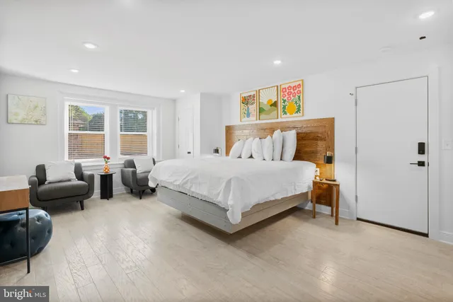 a bedroom with a bed and furniture