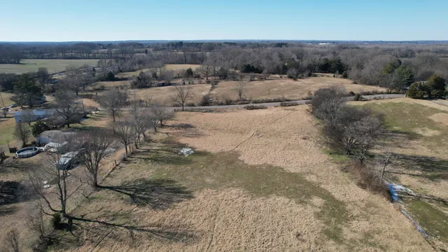 a view of a yard with an outdoor space