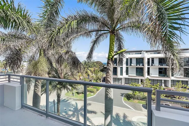 a bathroom with a toilet and a mirror