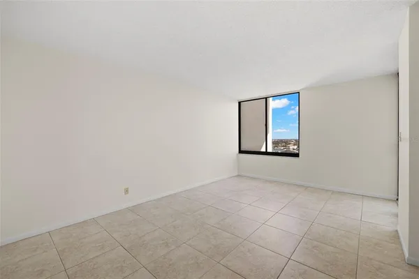 a room with gym equipment and a table