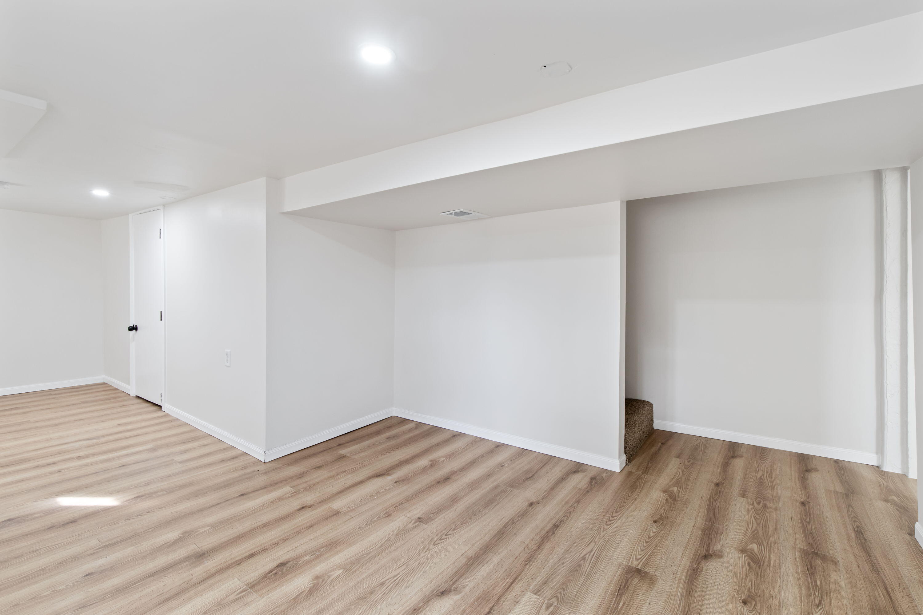 560 Rhode Island Ct. Gary, IN 46402 - Photo 23 of 49 a view of empty room with wooden floor