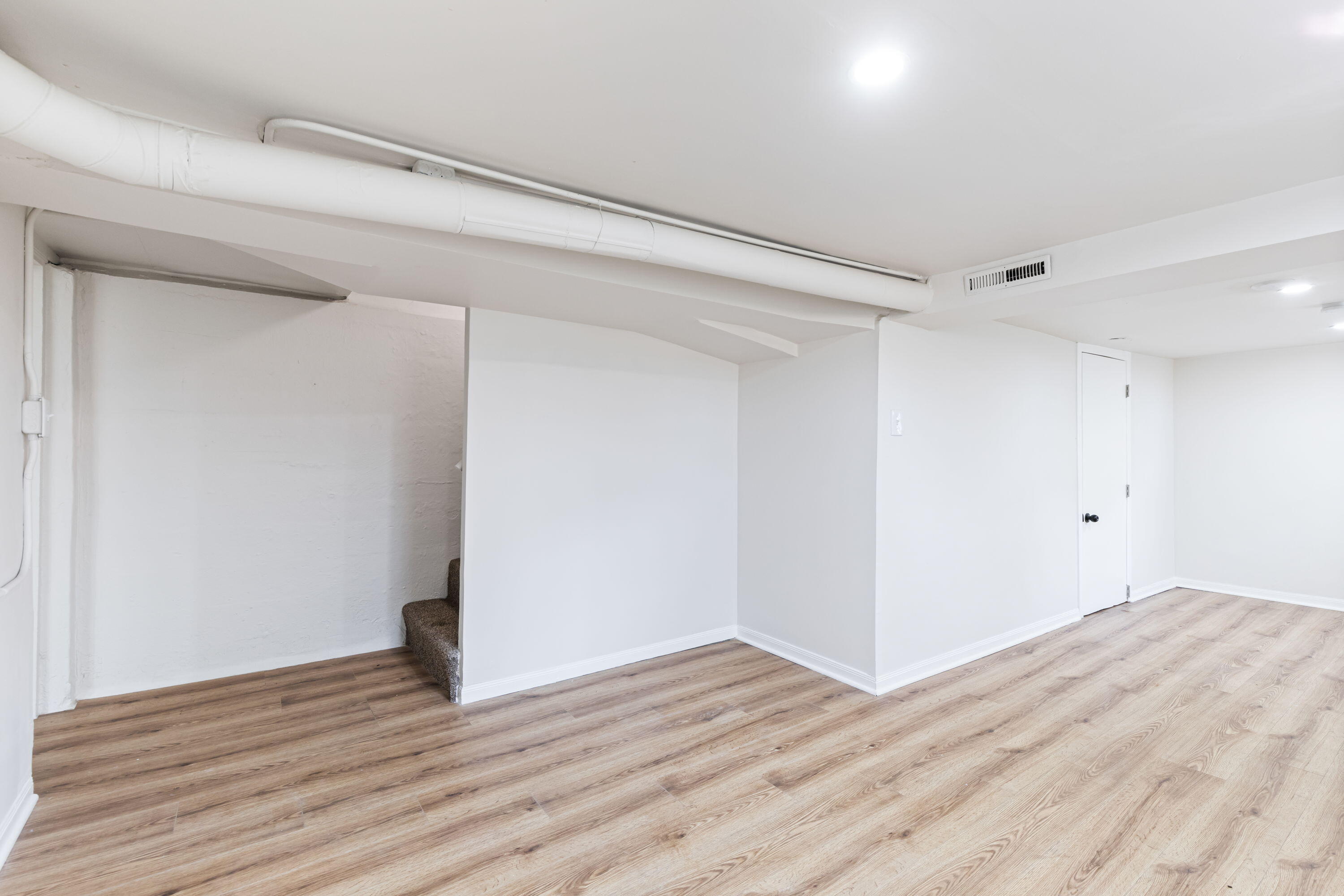 560 Rhode Island Ct. Gary, IN 46402 - Photo 42 of 49 a view of empty room with wooden floor