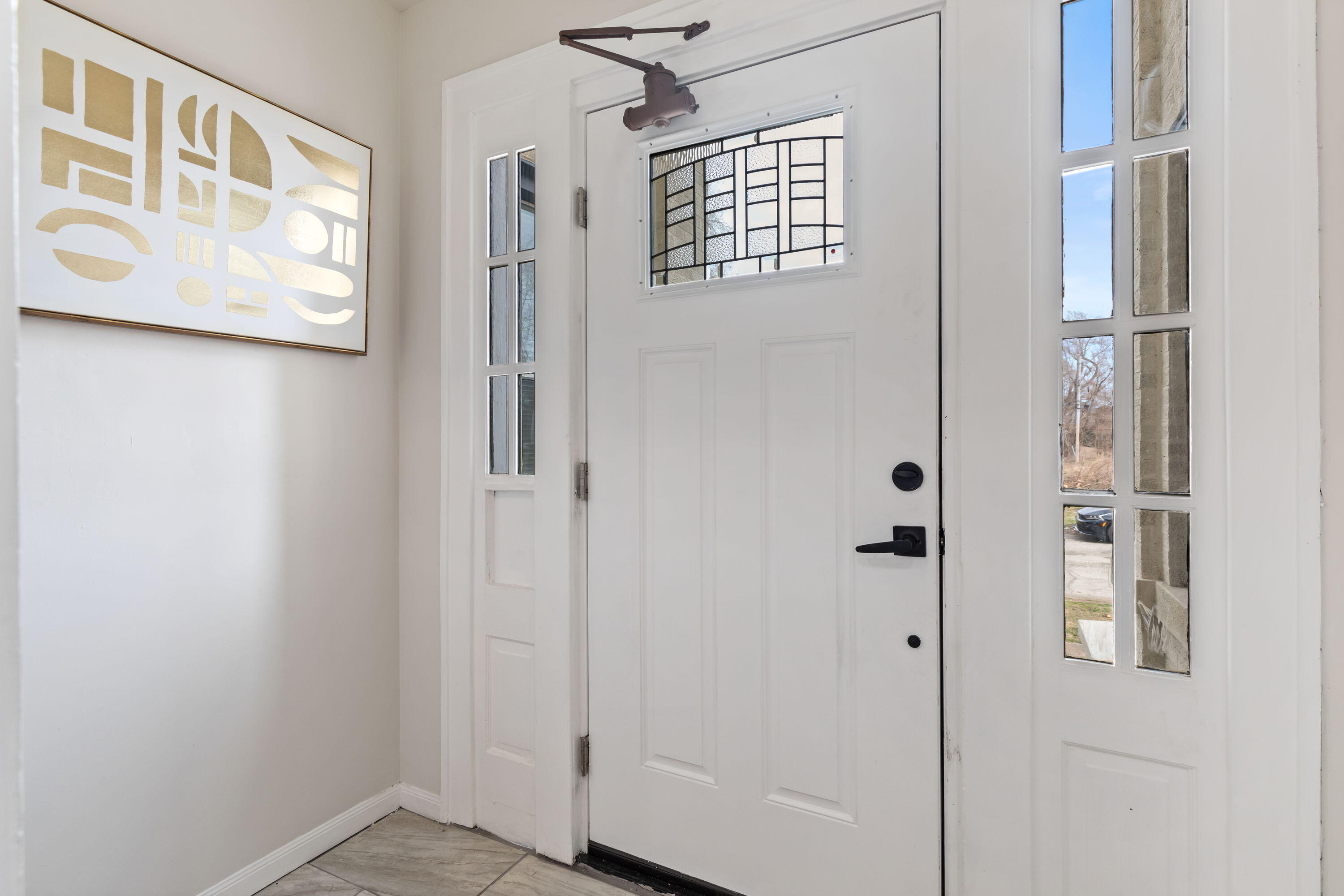 560 Rhode Island Ct. Gary, IN 46402 - Photo 5 of 49 a view of front door with hallway