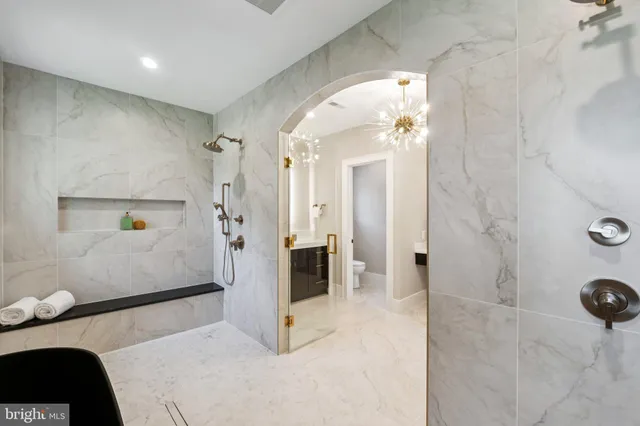 a living room with furniture and a gate