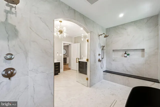 a bathroom with a sink and shower