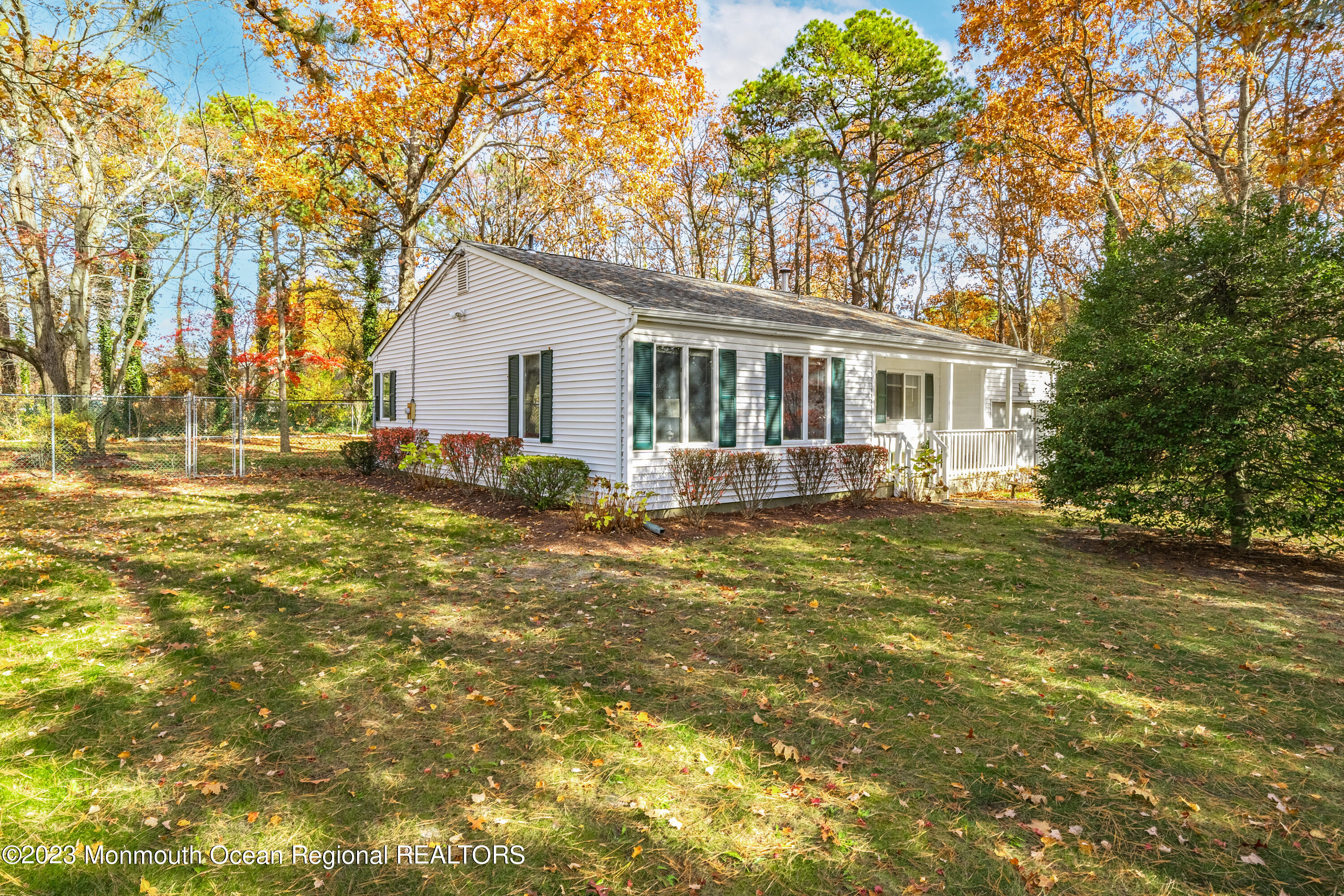 501 First Street Toms River, NJ 08757 - Photo 22 of 32 a front view of a house with garden