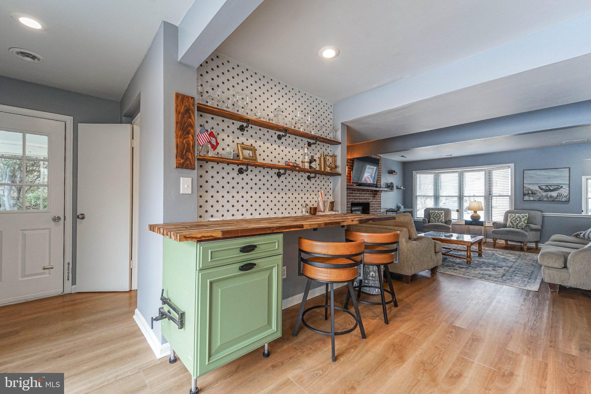 211 Queen Anne Road Stevensville, MD 21666 - Photo 7 of 33 Charming open-concept living space.