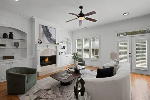 a kitchen with stainless steel appliances granite countertop a refrigerator a stove top oven a sink and dishwasher